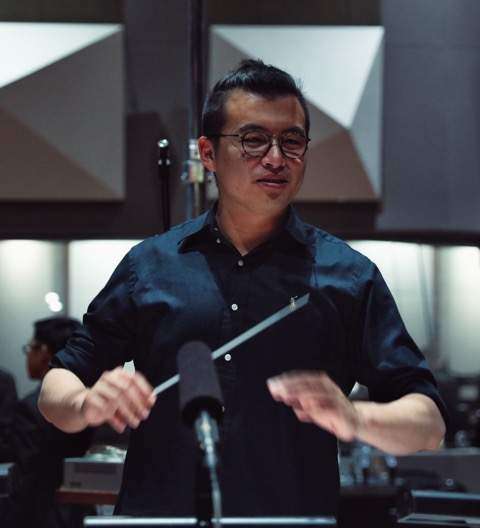 Samuel Lam conducting during a session
