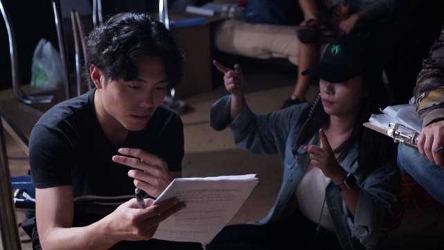 Davis Chang (left) with Assistant Director Olivia Wang (right)