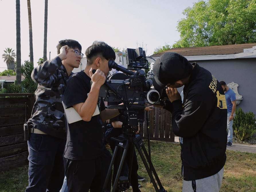 Yifu operating camera on set of AFTER, with 1stAC Edward Liu and 2nd AC Ziyue Alex Hu. Photo by Jerry Liu.